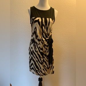 NY & Co Stretch. Sz. M. Brown with Animal print.